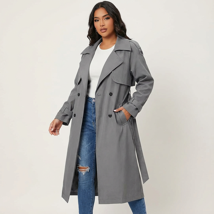 Classic women's long trench coat with a tailored fit, double-breasted design, and elegant belted waist.