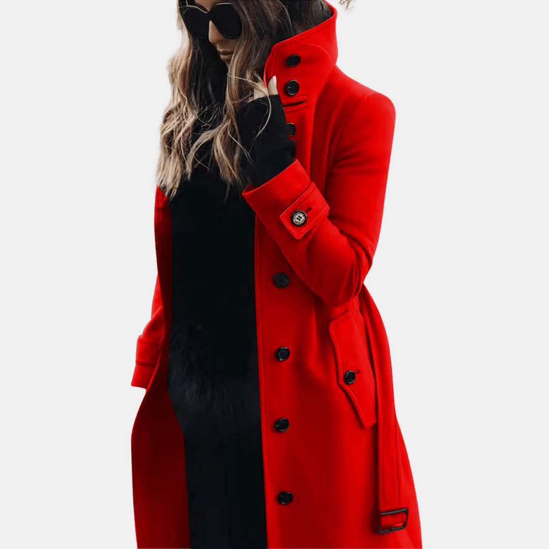 Stylish women's double-breasted long trench coat. Elegant and tailored, essential for classic sophisticated fashion.