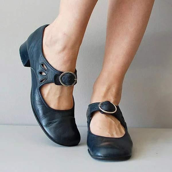 Elegant women's low heel slip-on shoes with rounded toe, perfect for comfortable office wear & dressy occasions.