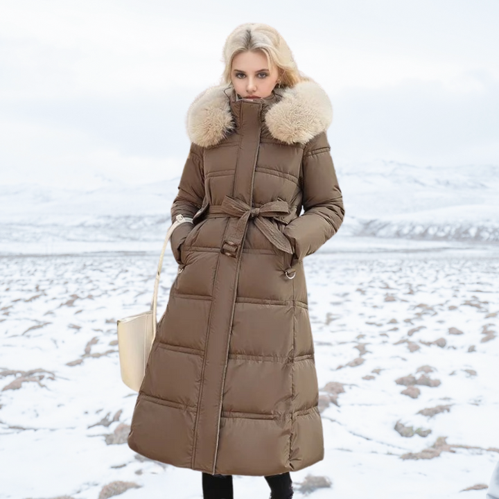 Elegant women's luxury faux fur winter coat, offering luxurious warmth & style for cold weather.