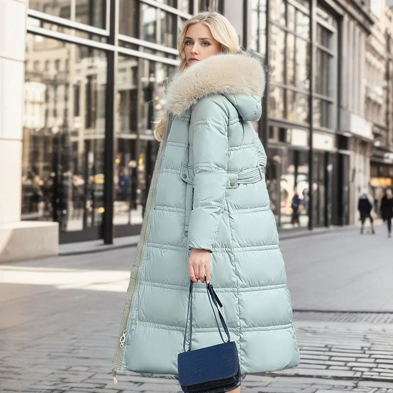 Chic women's faux fur winter coat, ideal for elegant warmth and sophisticated cold weather style.