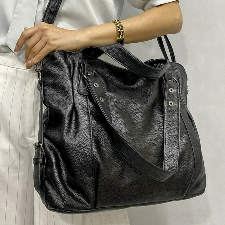 Sophisticated beige women's leather shoulder bag. EliteCarry luxury handbag, a chic fashion accessory.