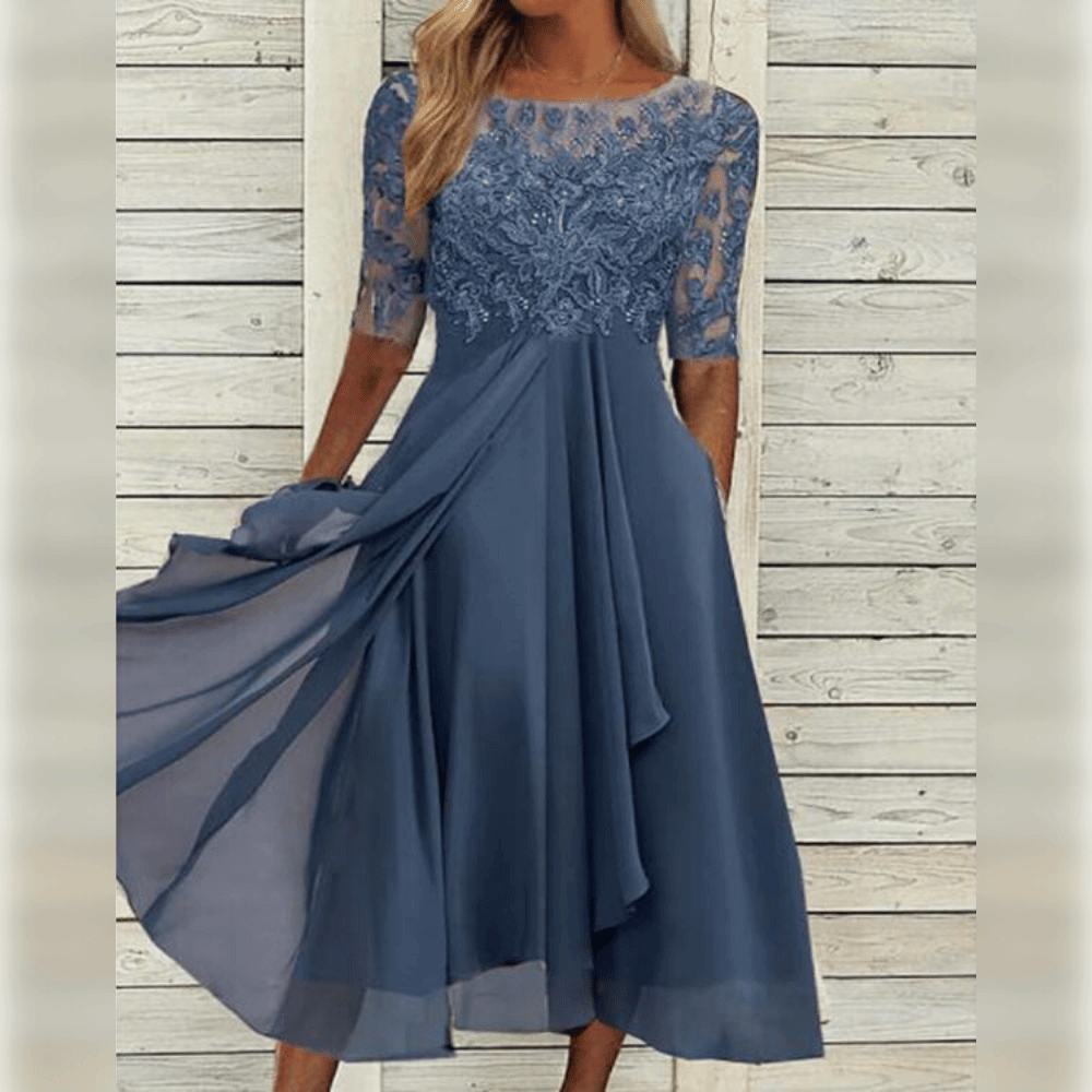 Elegant women's midi dress for any occasion. Chic and versatile, perfect for summer parties or wedding guests.