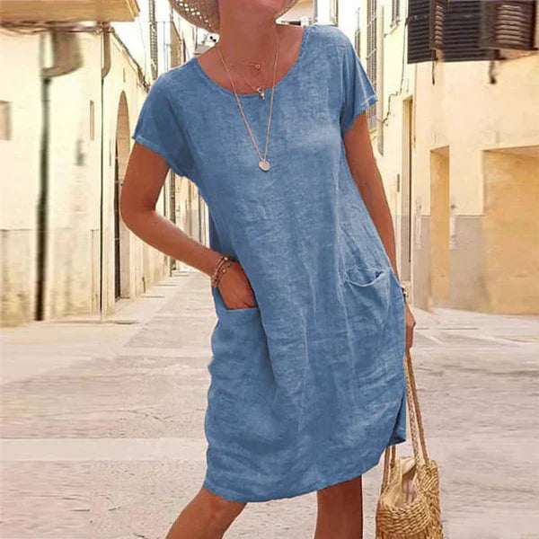 Stylish women's mini dress, elegant and comfortable, perfect for casual or versatile all-day wear.