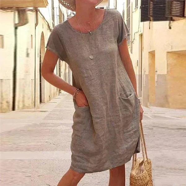 Women's flattering mini dress featuring tummy control for a confident and comfortable elegant look.