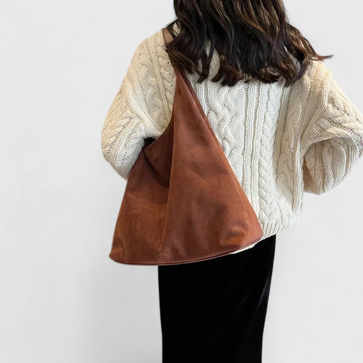 Chic vegan leather shoulder bag for women, a versatile minimalist crossbody handbag for daily use.