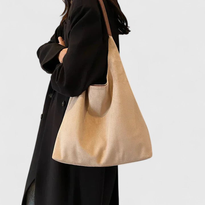 Stylish women's elegant minimalist shoulder bag, a fashionable everyday handbag and chic accessory.