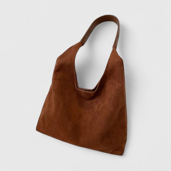 Everyday elegant women's shoulder bag. Minimalist vegan leather crossbody handbag for versatile style.
