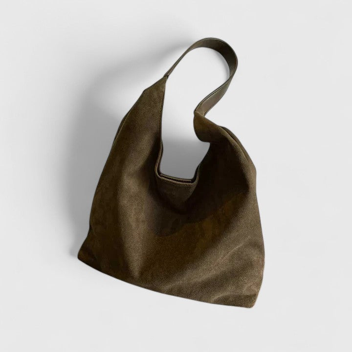 Women's elegant minimalist vegan leather bag. Versatile shoulder bag and crossbody handbag for daily chic.