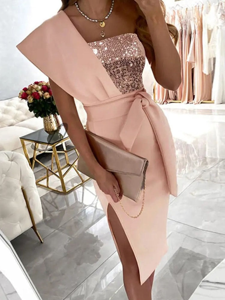 Sophisticated women's pink one-shoulder formal gown with a stylish slit, ideal for parties & special occasions.