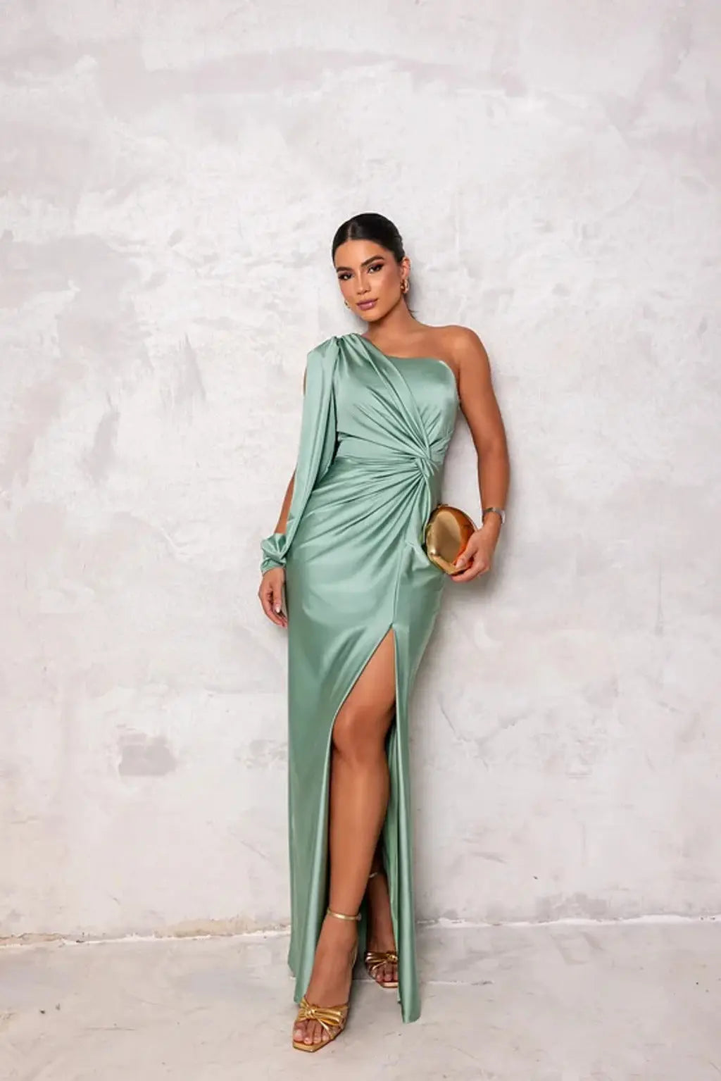 Stylish royal blue one-shoulder flowy gown, a beautiful choice for an elegant evening or party.