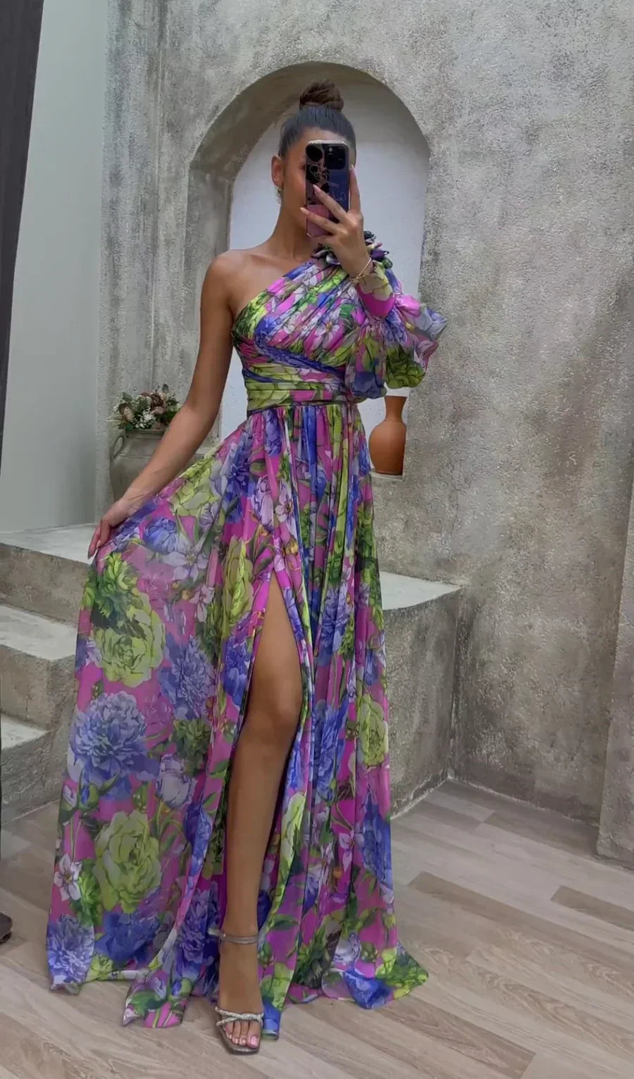 Elegant women's one-shoulder flowy maxi dress with vibrant floral print, perfect for summer parties & special occasions.