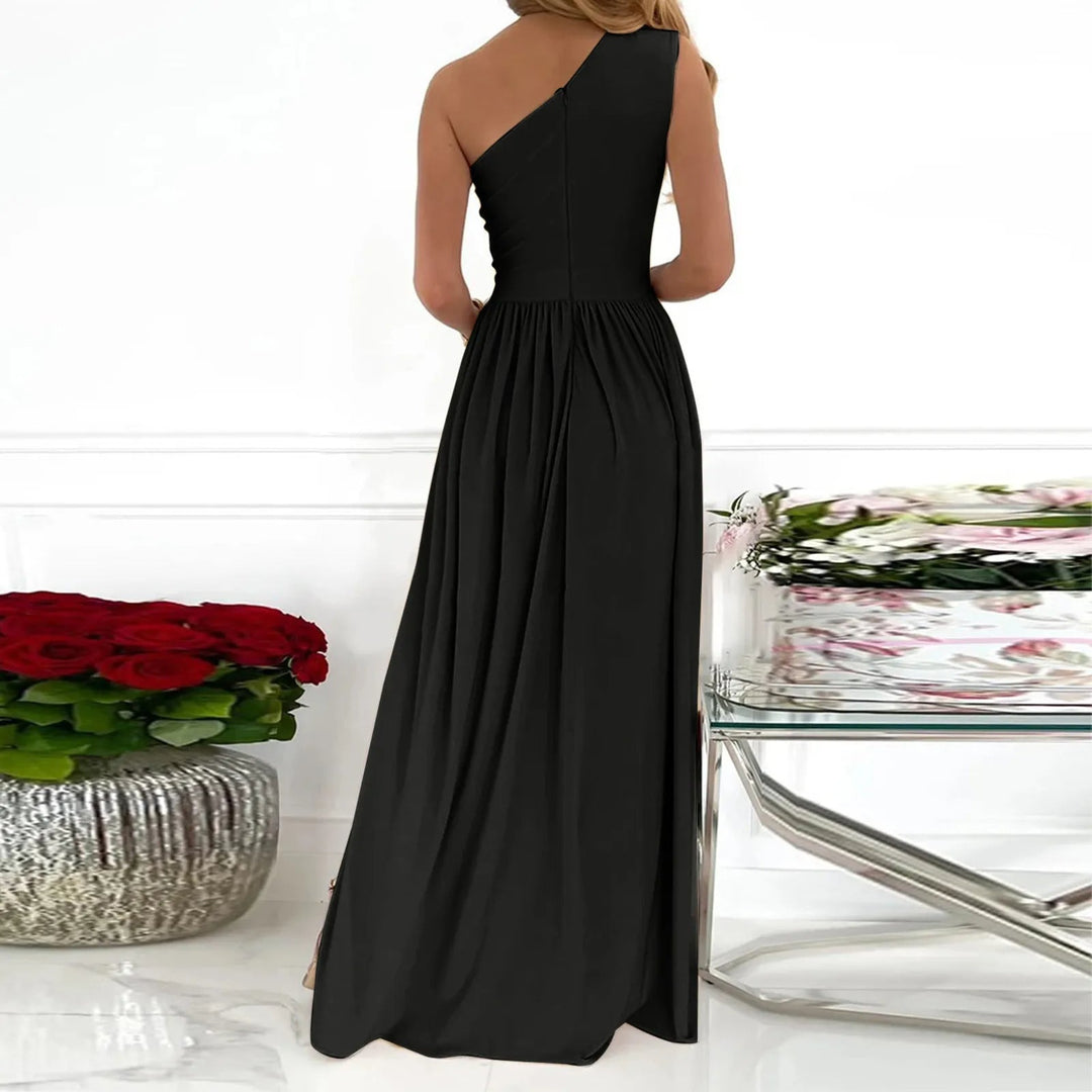 Black one-shoulder maxi dress for women, featuring an elegant split. Ideal for formal events & cocktail parties.