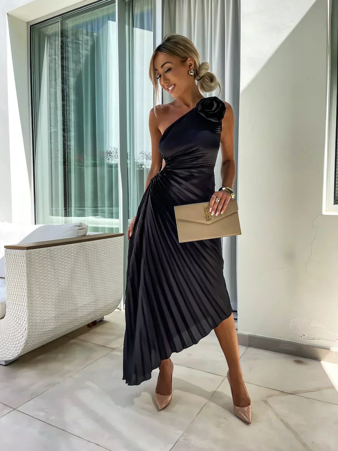 Sophisticated women's one-shoulder midi dress, featuring elegant pleats for any special event.