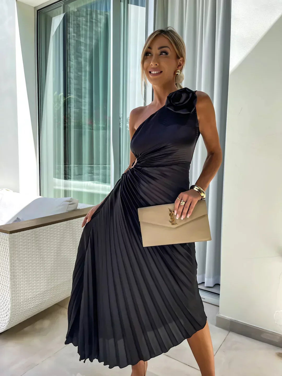 Women's elegant party dress: one-shoulder midi style with beautiful pleats, perfect for evening.