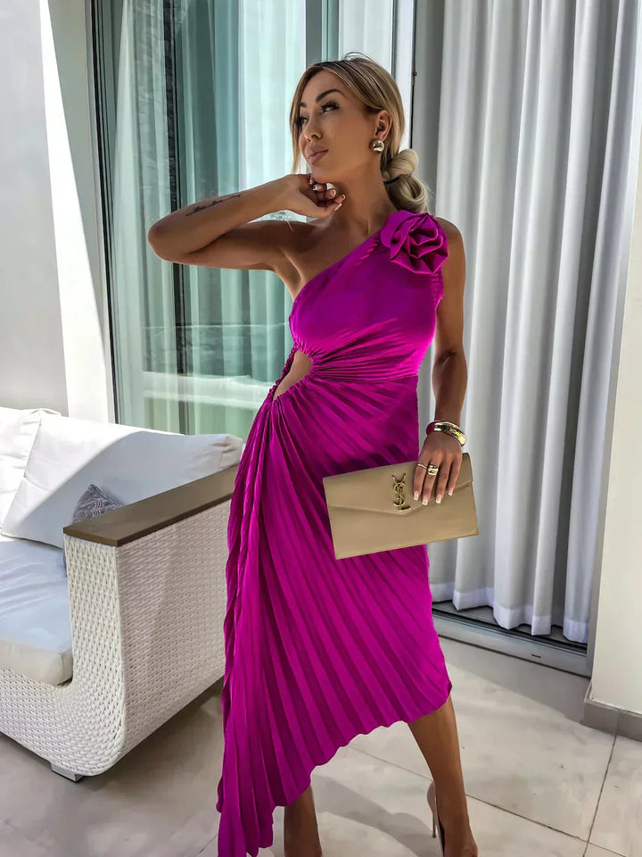 Beautiful women's one-shoulder midi dress with flattering pleats, ideal for a stylish evening.