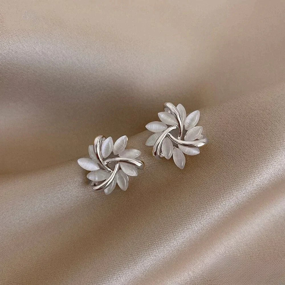Sophisticated gold & silver opal flower earrings. Dainty floral gemstone jewelry for women, an elegant accessory.