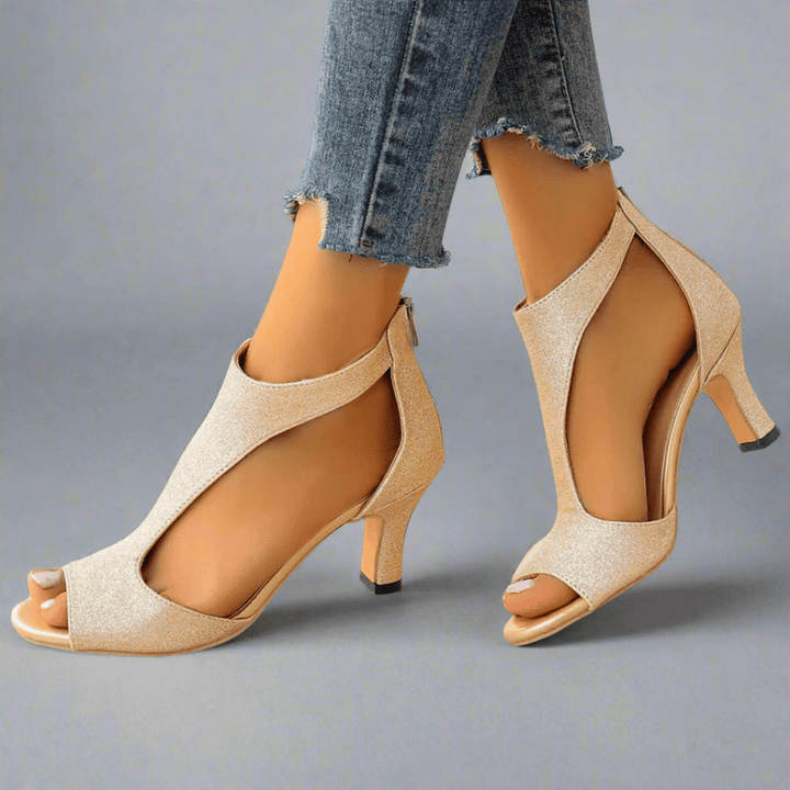 Stylish black orthopedic dress heels for women, perfect for formal events, parties, or work attire.