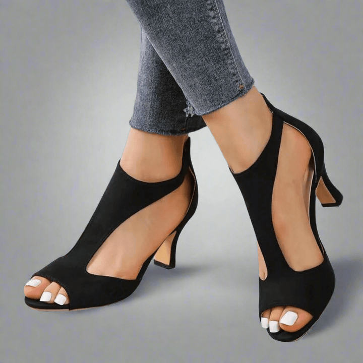 Comfortable women's orthopedic pumps with arch support, featuring a sleek design for foot health & fashion.