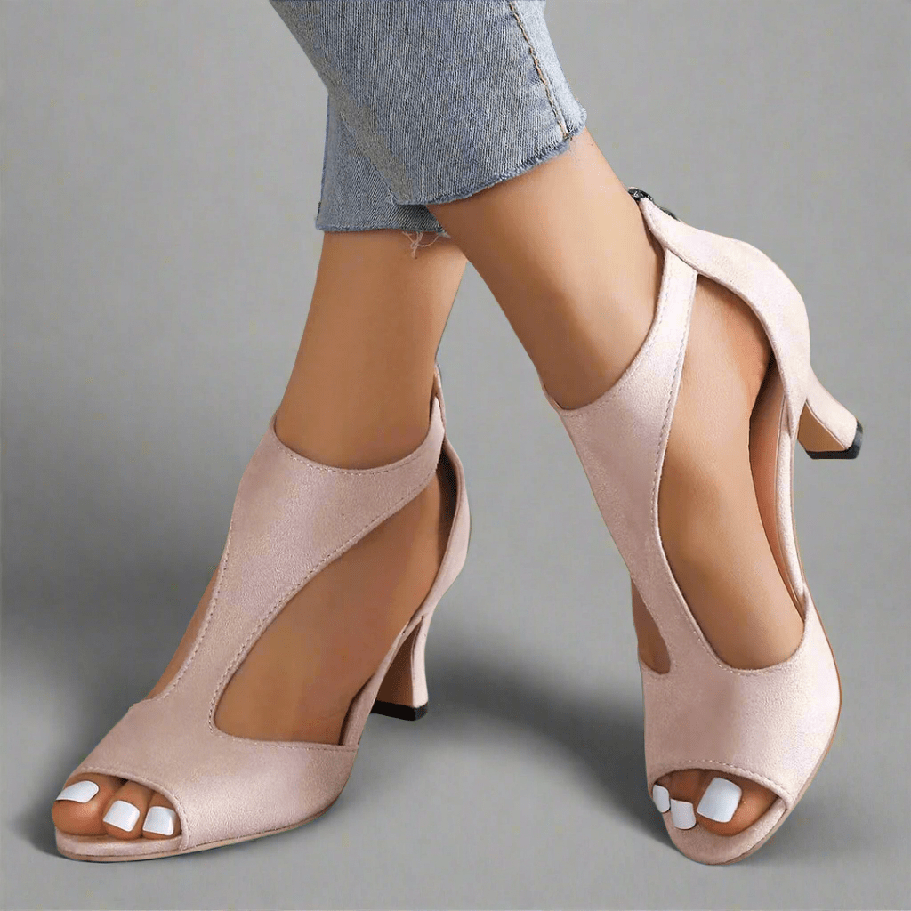 Detail shot of elegant women's orthopedic high heels, showcasing premium material & cushioned sole for comfort.
