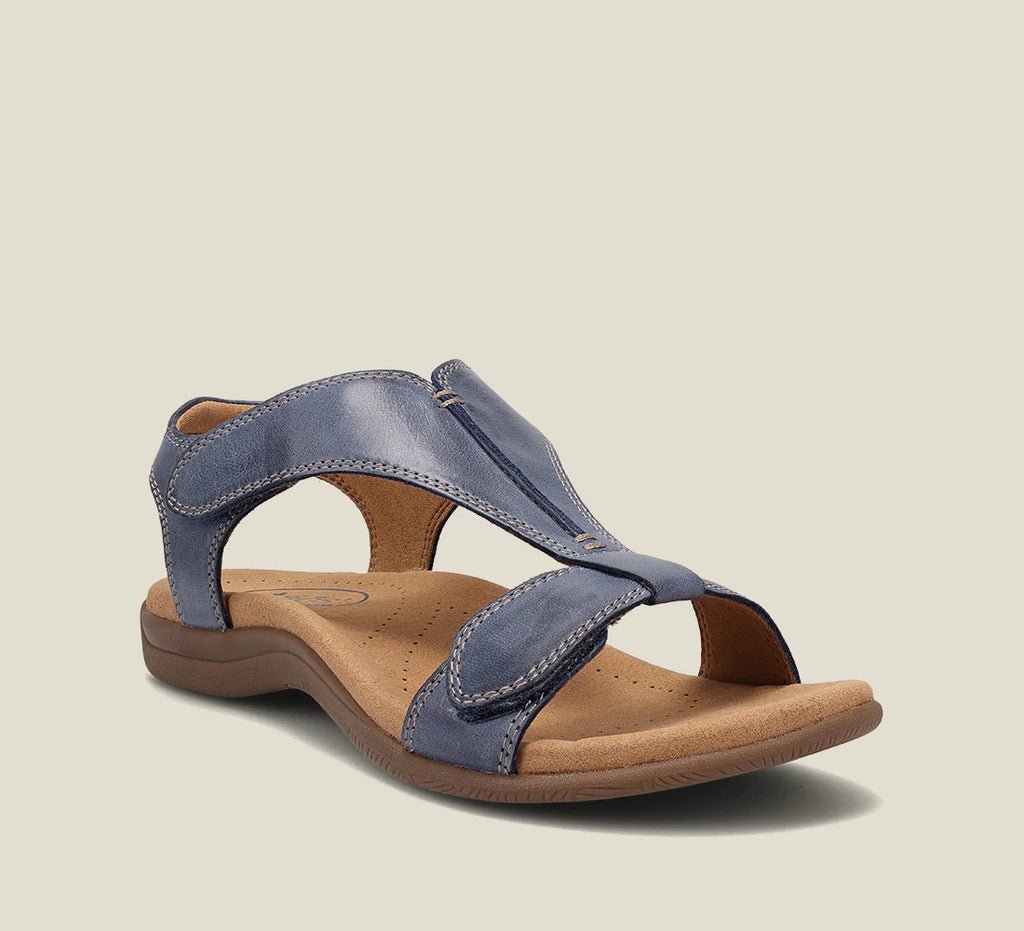 Close-up of comfortable women's sandals, highlighting soft materials and elegant design. Ideal for walking.