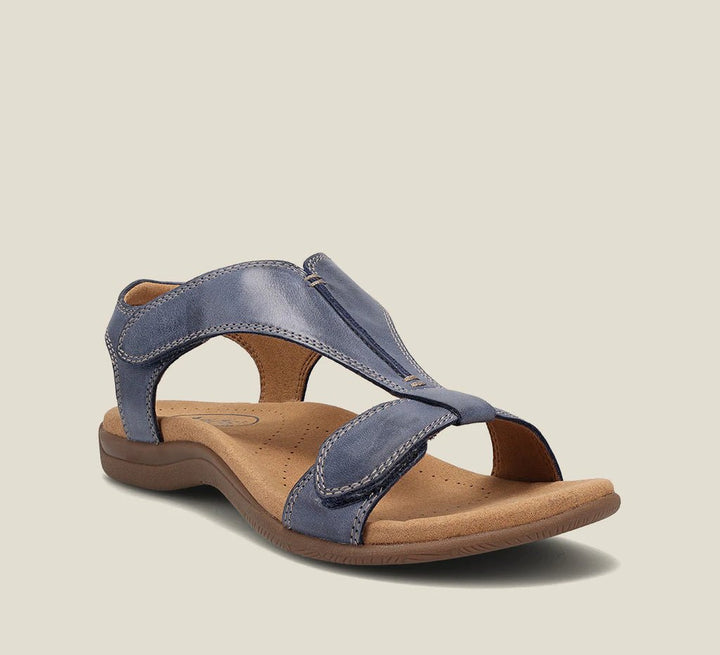 Close-up of comfortable women's sandals, highlighting soft materials and elegant design. Ideal for walking.