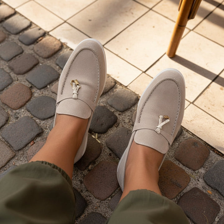 Elegant women's pointed-toe loafers, perfect for office or casual wear, offering all-day comfort.