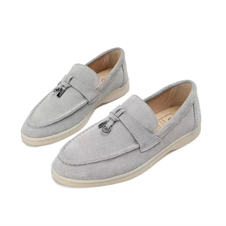 Elegant & comfortable women's pointed-toe loafers, versatile flats for office or casual style.