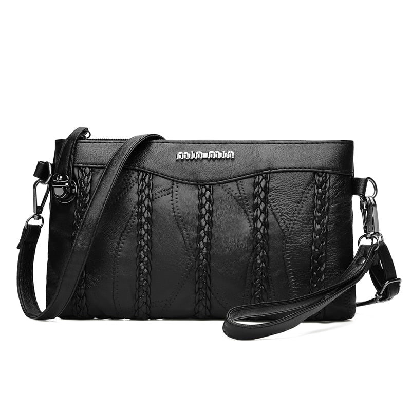 Elegant women's PU leather crossbody clutch bag. Spacious interior for daily essentials & versatile style.