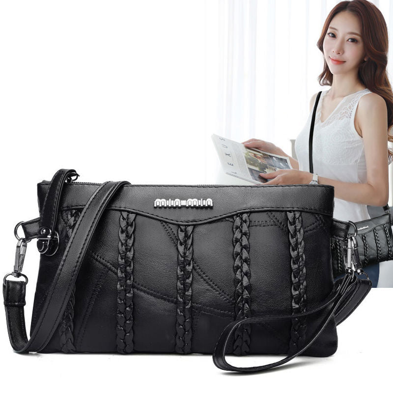 Secure closure and structured design on a women's PU leather crossbody bag for organized daily items.