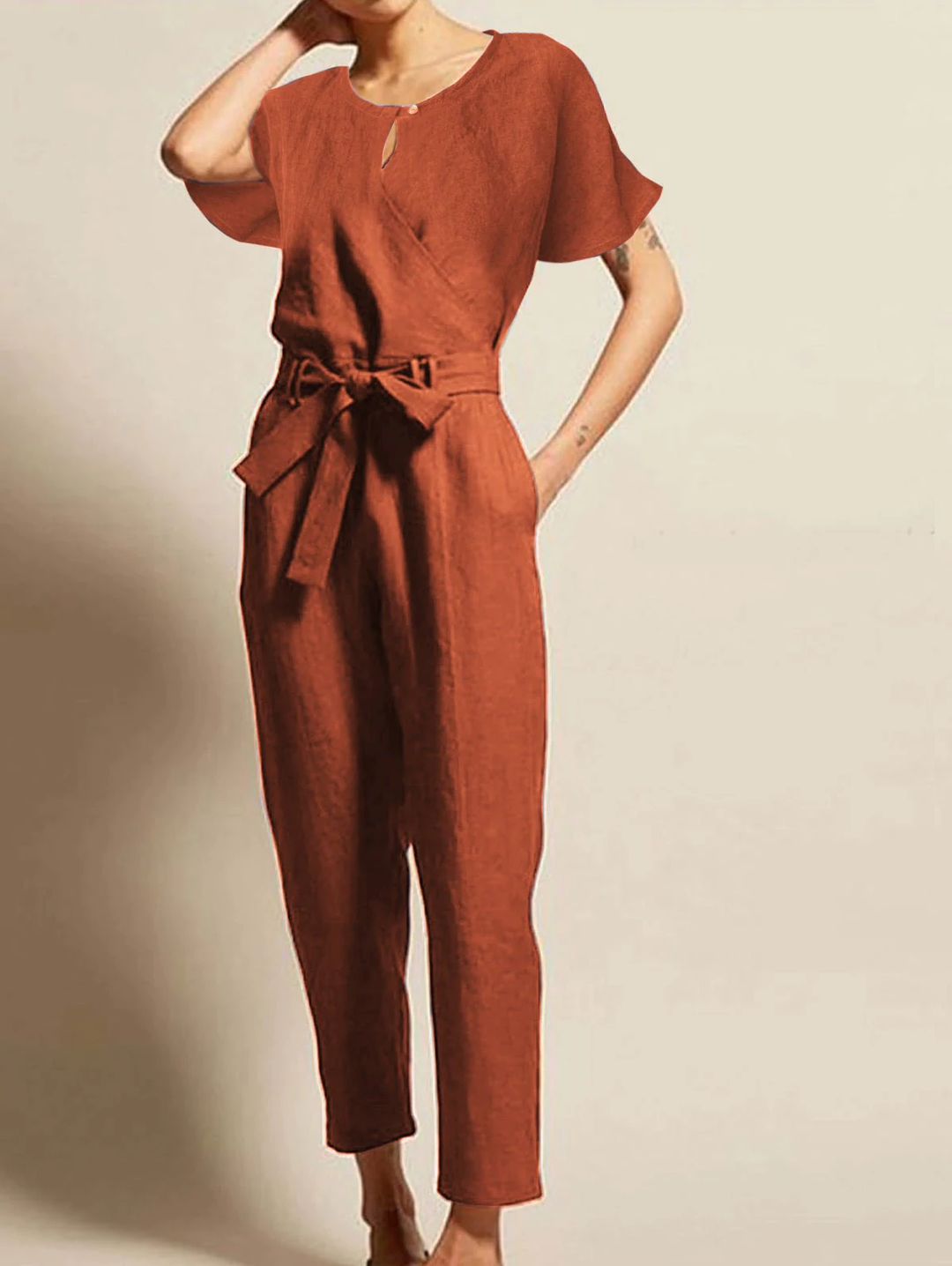 Elegant women's radiant summer jumpsuit with short sleeves & belt. Perfect for casual or dressy occasions.