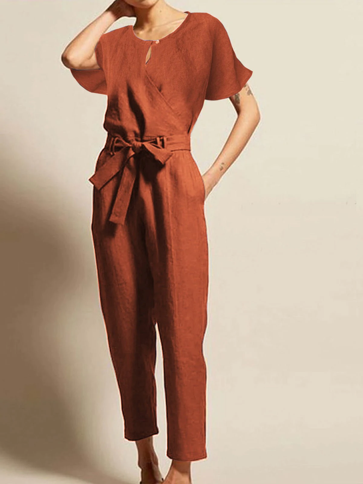 Elegant women's radiant summer jumpsuit with short sleeves & belt. Perfect for casual or dressy occasions.