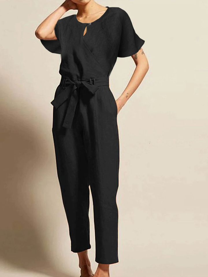 Mathilda women's one-piece summer jumpsuit, short-sleeved & belted, in a radiant fabric for effortless style.