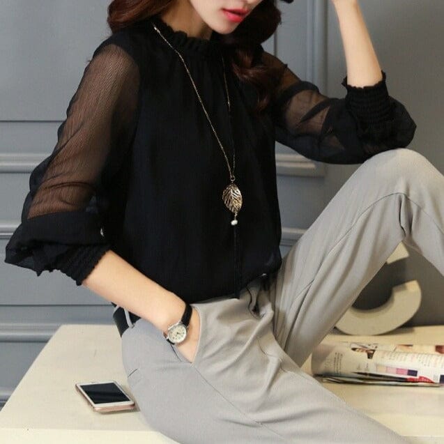 Elegant women's ruffle blouse with stylish sheer puff sleeves, perfect for spring fashion & office wear.