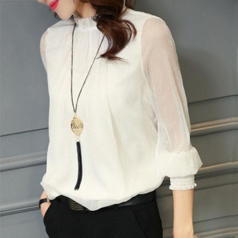 Modern women's long sleeve blouse with ruffles & sheer puff sleeves. Feminine, stylish & comfortable.