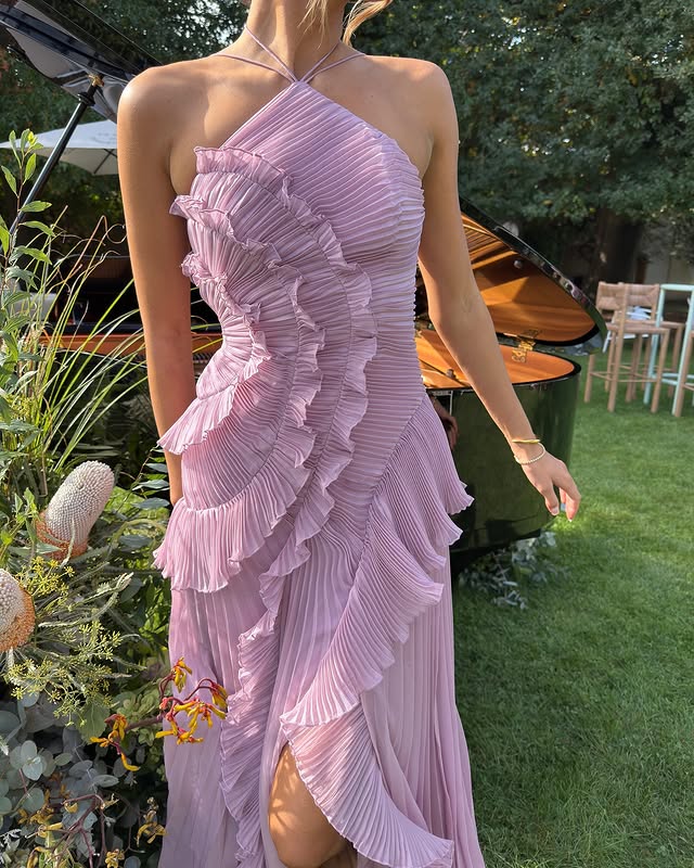 Stylish women's ruffled halter maxi dress, a versatile elegant gown for parties & formal events.