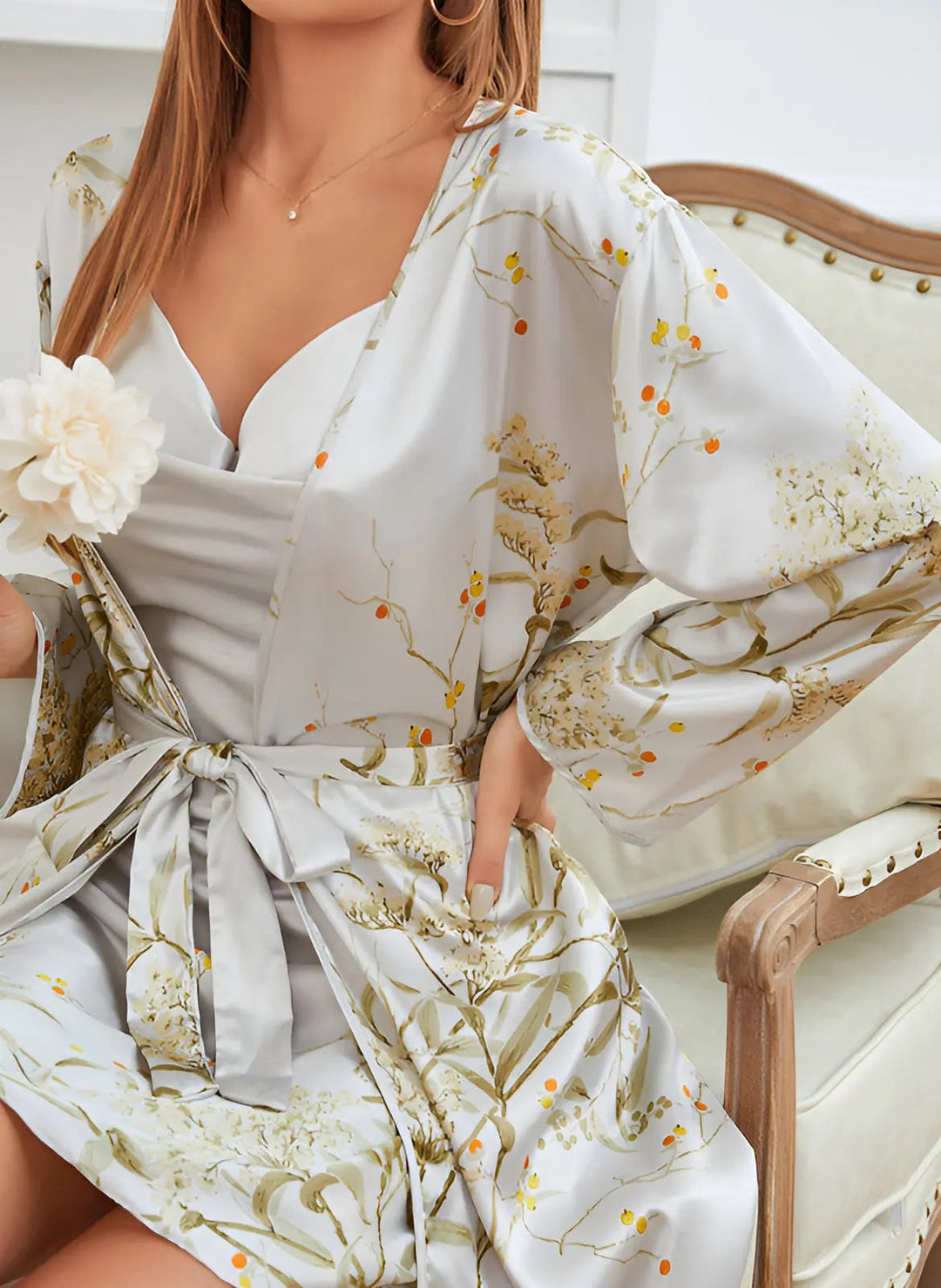 Luxurious satin kimono robe with long sleeves, perfect as elegant sleepwear or relaxation wear for women.