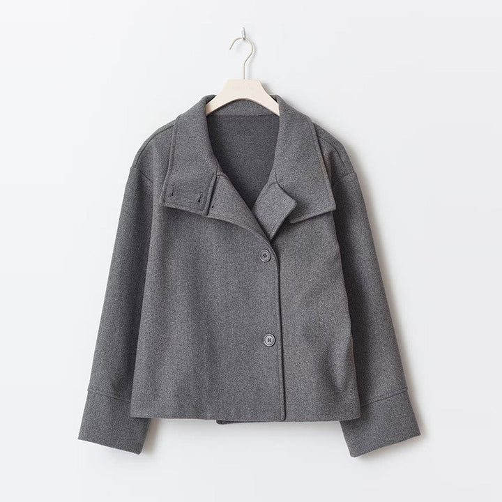 Chic women's double-breasted short jacket. A versatile outerwear piece for everyday elegant fashion.