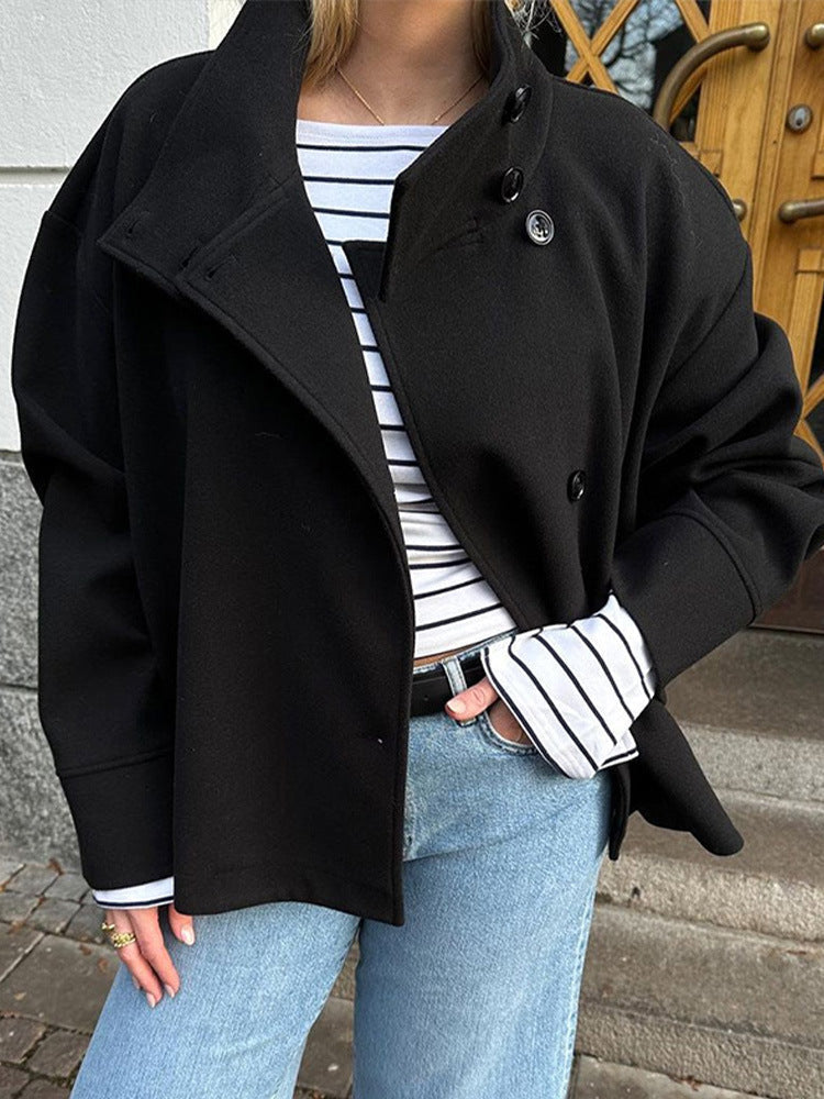 Sophisticated women's short jacket with double-breasted design. Fashionable & elegant for any occasion.