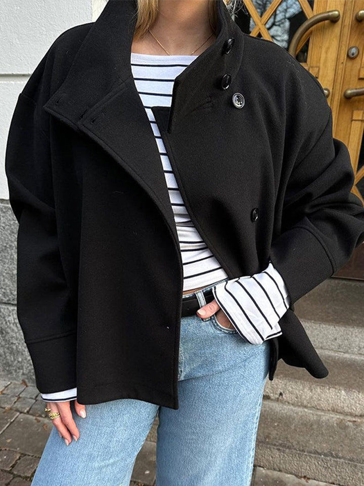 Sophisticated women's short jacket with double-breasted design. Fashionable & elegant for any occasion.