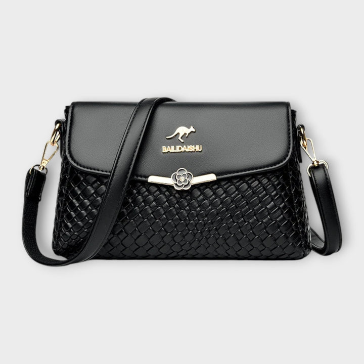 Elegant women's shoulder bag, stylish and versatile for everyday use or special occasions, with a spacious interior.
