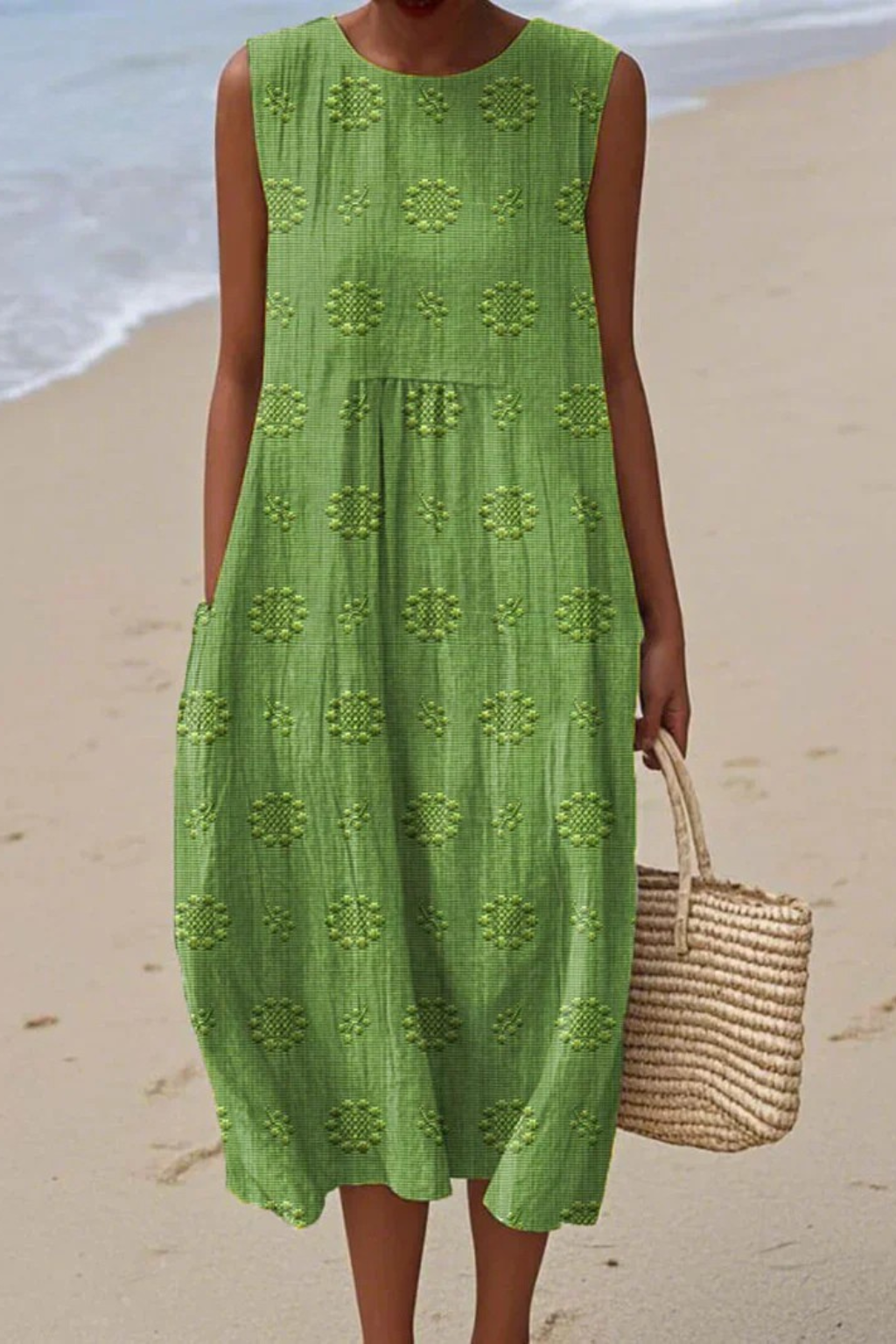 Elegant women's sleeveless midi dress with delicate embroidery. Perfect for summer casual wear.