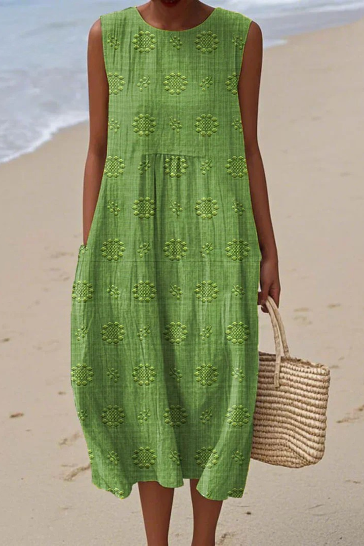 Elegant women's sleeveless midi dress with delicate embroidery. Perfect for summer casual wear.