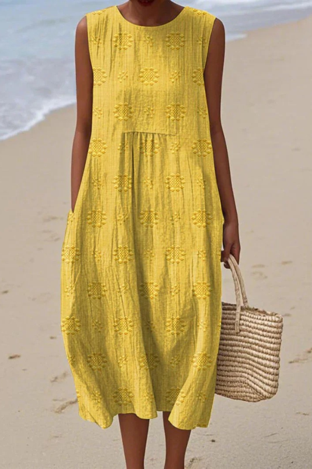 Beautiful women's sleeveless embroidered day dress. Flowy design for comfortable casual or elegant spring/summer wear.