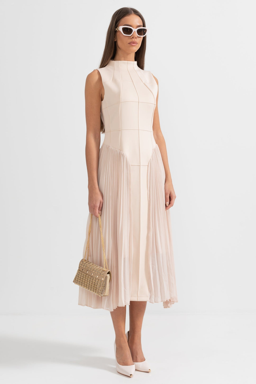 Stylish women's sleeveless midi dress featuring a flattering pleated skirt, perfect for any special occasion.