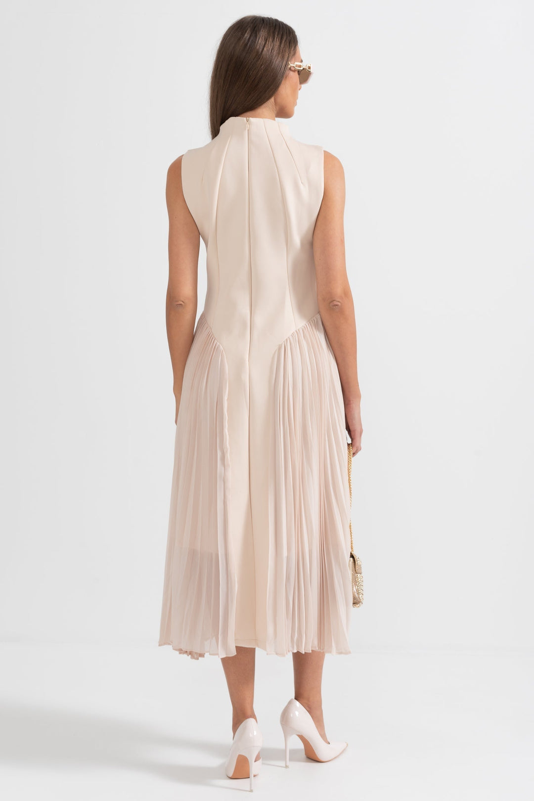 Beautiful women's sleeveless pleated midi dress, a sophisticated choice for evening events & formal gatherings.