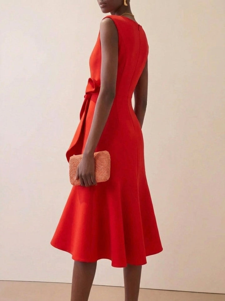 Vibrant red midi cocktail dress with elegant ruffles, sleeveless design for women's party or wedding guest attire.