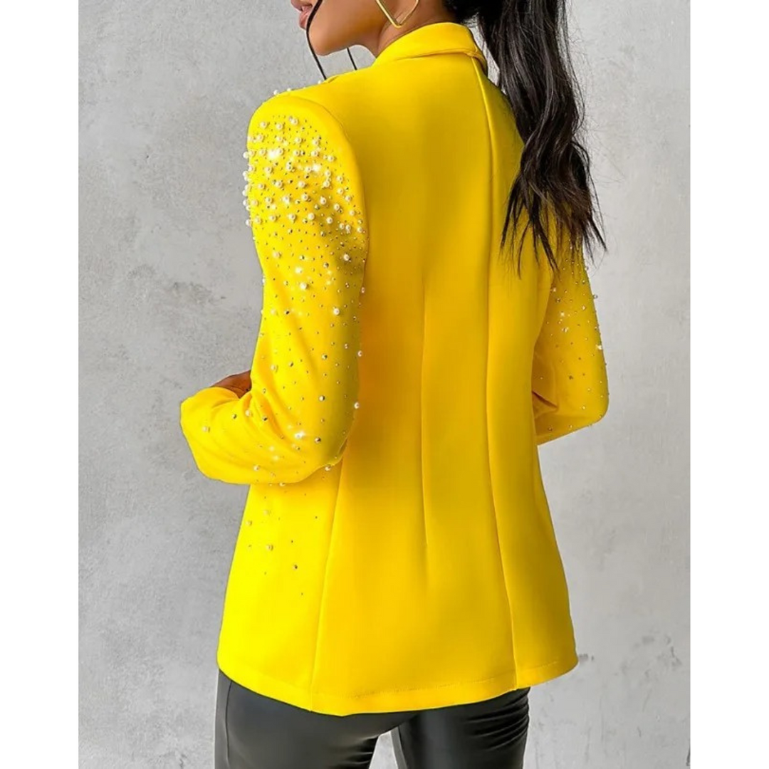 Amara elegant women's slim fit blazer with intricate pearl details. A chic fashion statement for work or evening.