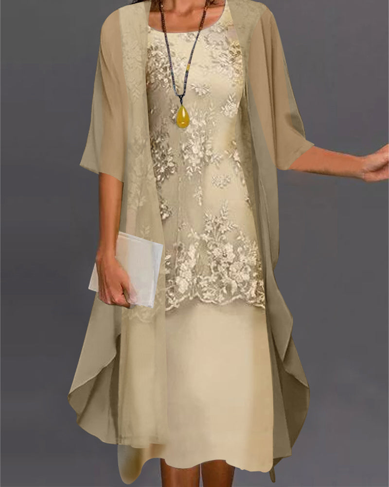 Elegant women's smock dress with delicate lace details, round neck, & 3/4 sleeves. Versatile for spring & summer.