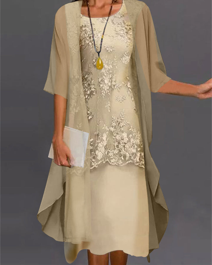 Elegant women's smock dress with delicate lace details, round neck, & 3/4 sleeves. Versatile for spring & summer.